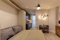 Nice Basement studio with private patio. - B&B Londres