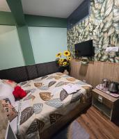 Zimmer mit Kingsize-Bett