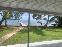 Maison sur le lagon avec son ponton - B&B Uturoa
