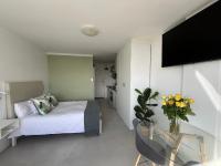 Sunny Kloof Street Studio Apartment - Chambres d’hôtes Le Cap