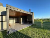 Casa con Pileta, Parrilla y Jardín en Rosario, Funes, Santa Fe - Chambres d'hôtes Funes