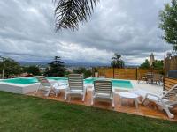 Residencia Premium con Vista Panorámica y Pileta Climatizada - Chambres d'hôtes Villa Carlos Paz
