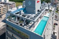 Apartamento com Vista Mar e Piscina - Chambres d’hôtes Bombinhas