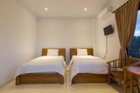 Camera Deluxe Doppia con Letti Singoli