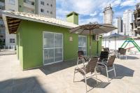 Apartamento a 400M PRAIA com PISCINA sacada com CHURRASQUEIRA privativa Wi-Fi Portaria 24h PLAYGROUND INFANTIL vaga privativa de GARAGEM Reserve agora mesmo - Ferienwohnung Bugres