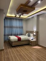 Chambre Double avec Balcon (2 Adultes + 1 Enfant)