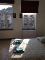 Camera Familiare con Bagno in Comune