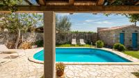 Rustic villa Janko with pool in Sveti Lovrec - Bed and Breakfast Vošteni