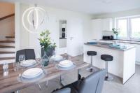 Exklusives Ferienhaus Finja mit Sauna, Garten & offener Wohnküche - Chambres d’hôtes Bremerhaven