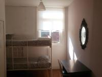 Camera Familiare con Bagno in Comune