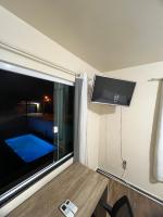 Pe de manga Quarto terceiro andar cama solteiro - B&B Foz de Iguazu