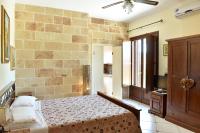 Camera Matrimoniale Deluxe (2 Adulti + 1 Bambino) 