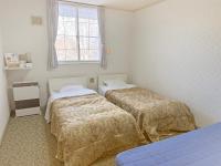 Camera Doppia con Letti Singoli con Bagno