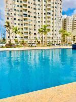 Apartamento novo, excelente localização, 7 min da praia - Chambres d'hôtes São Luís