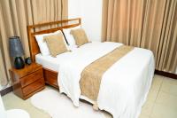 The Modern Nest Stylish 1BR MbeziBeach with Fast WiFi, Work Desk & Smart Home - B&B Dar es Salaam