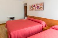 Camera Doppia con Letti Singoli e Bagno in Comune