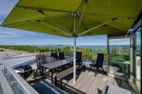 Prora - Exklusives Penthouse mit Meerblick, privater Dachterrasse, E-Ladesäule und Waschmaschine - Camelot - Ferienwohnung Ostseebad Binz