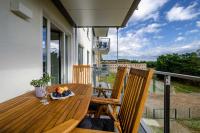 Prora - Ferienwohnung mit Balkon und E-Ladestation - Seehnsucht - B&B Ostseebad Binz