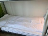 Cama en habitación compartida mixta de 4 camas