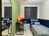 2-bedroom apartment with balcony facing the woods - Chambres d’hôtes São Carlos