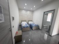 Chambre 2 Lits King-Size
