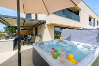 Atemberaubendes Apartment mit Whirlpool, Grillbereich, Smart TV - B&B Umag