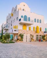 Seaside Garden Retreat-Santorini Village Drymades - Chambres d'hôtes Dhërmi