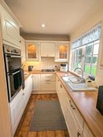 Luxury 2 Bed Cottage with Log Fire Hot Tub & Sauna - Chambres d’hôtes Whitegate