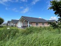 Zweite Heimat 66 - Ferienhaus mit Sauna, Kaminofen & eingezäuntem Garten - direkt an der Nordsee - B&B Dagebüll