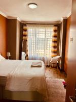 Pleasant Nest Homestay near JKIA Airport and SGR Station Nairobi - Chambres d'hôtes Nairobi