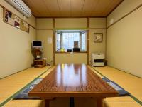 Camera Familiare con Bagno in Comune