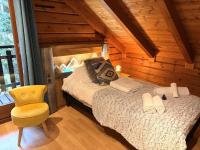 LE GRIZZLY Chalet en bois avec SPA Jacuzzi - B&B La Bresse