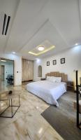 Modern 2-bedroom Duplex Home with 24hrs Light, Gym & Pool - Chambres d’hôtes Lekki Peninsula
