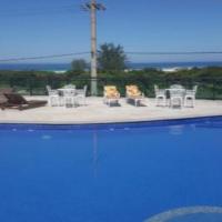 Apartamento em condomínio frente ao mar com piscina - B&B Arraial do Cabo