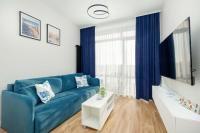 Blue and Beige Apartment in Sianożęty with Seasonal Pool, Parking and Balcony by Noclegi Renters - B&B Sianożęty