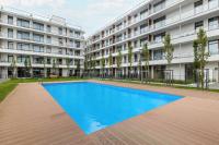 Blue and Beige Apartment in Sianożęty with Seasonal Pool, Parking and Balcony by Noclegi Renters - Chambres d'hôtes Sianożęty