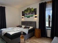 Luxe Kamer met 1 of 2 Bedden en Uitzicht op de Rivier