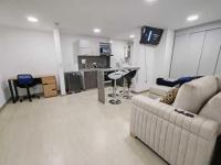 Apartamento moderno frente a la Universidad Santo Tomás WiFi y parqueadero - Chambres d'hôtes Tunja