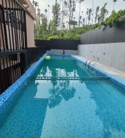 Elnido Holiday Home - Chambres d’hôtes Meppādi