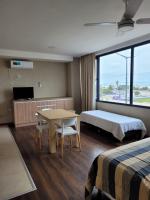 Monoambiente Michell vista al mar pileta climatizada - B&B Necochea