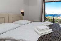 Deluxe tweepersoonskamer met balkon en uitzicht op zee