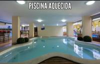 Apto ideal p Família, Piscina Térmica 350m Praia - Chambres d'hôtes Bombinhas