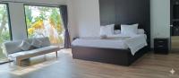 2 Bed Room Spacious Family House with Garden View - Chambres d’hôtes Jembrana