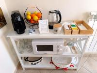 Domus REA - Appartamento moderno con check-in automatico H24 e area esterna privata - B&B Bracciano