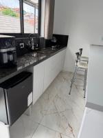 Suítes Aconchego de Campos - Chambres d'hôtes Campos do Jordão