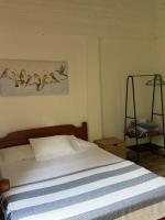 Kamer met Queensize Bed en Uitzicht op de Tuin