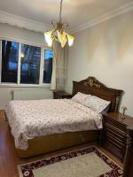 Kamer met Queensize Bed en Uitzicht op de Tuin