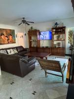Casa de praia Bertioga Riviera Guaratuba 20 metros da praia - Chambres d'hôtes Bertioga
