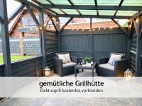 strandnahe Familien-Oase mit Kinderbuggy - Chambres d'hôtes Bensersiel