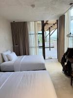 Camera Deluxe Doppia con Letti Singoli